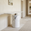 Sesto white marble console table viewed from above at an angle in a contemporary hallway