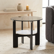 Imperia grey glass and white ceramic round coffee table viewed from above at an angle in a contemporary living room