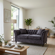 Sabrina grey velvet sofa in a wide Scandinavian living room view