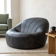 Hoxton antique black leather cocoon chair viewed from above at an angle in a contemporary living room