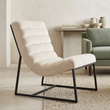 Vogue ivory velvet channel tufting lounge chair viewed from above at an angle in a contemporary living room