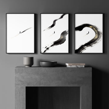 Japandi Wall Decor Black Ink Brush Solitary Figure with Gold-Toned Accents displayed on a wall in a styled room