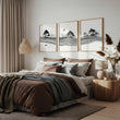 Japandi Landscape Artworks | Japanese Ink Grey Misty Trees & Red Moon displayed on a wall in a styled room