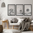 Large 3 Piece Wall Art for Living Room | Scandinavian Nordic Trees & Moon Landscape displayed on a wall in a styled room — view 7