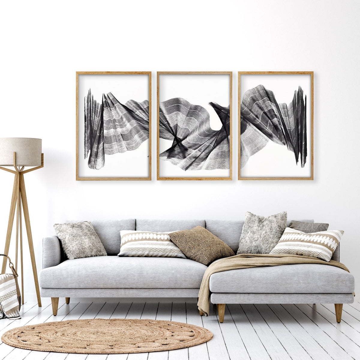 Large wall art for Living Room Abstract Charcoal Flowing Waves Wall Art displayed on a wall in a styled room — view 10
