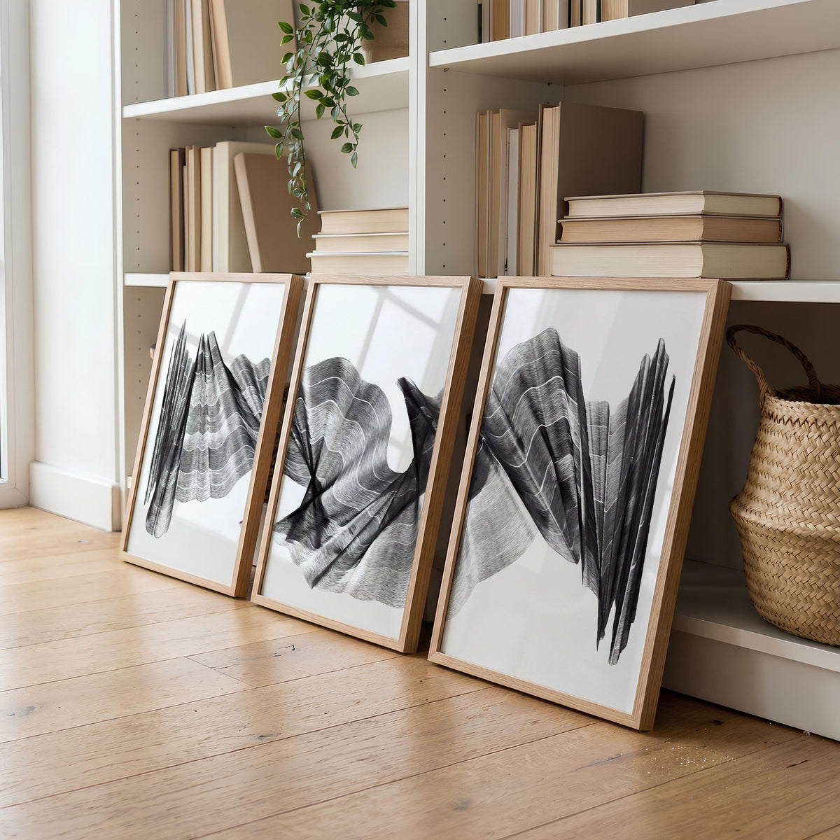 Large wall art for Living Room Abstract Charcoal Flowing Waves Wall Art displayed on a wall in a styled room — view 2