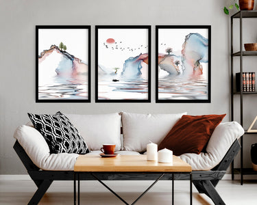 Styled living room with framed wall art and warm home decor accents