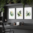 Paintings for Home Office Botanical Watercolour Leaves Green & Gold wall art displayed on a wall in a styled room