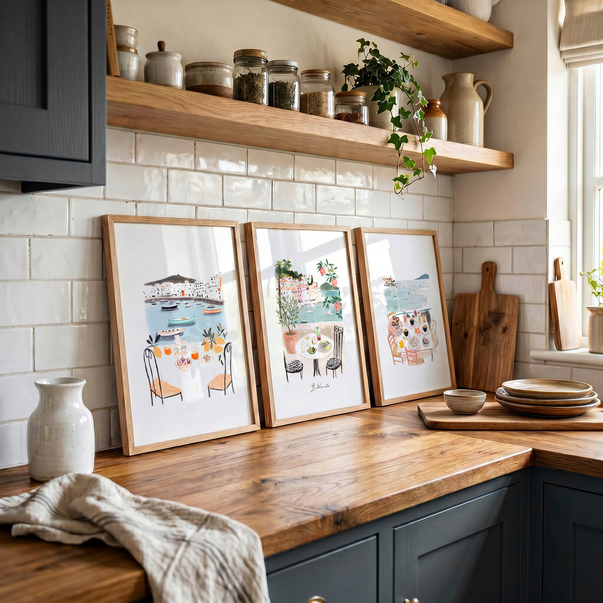 Paintings for Kitchen Walls Mediterranean Coastal Dining Scenes "La Dolce Vita" displayed on a wall in a styled room — view 3