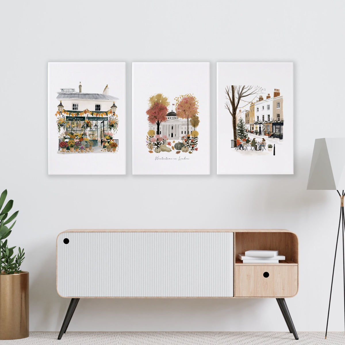 Picture for Wall Living Room London Travel wall art | "Wintertime in London" Covent Garden Terracotta Set of 3 displayed on a wall in a styled room — view 11