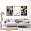 Pictures for the Living Room Wall Black & White Wildlife Safari Art wall art — Elephants, Birds & Zebra displayed on a wall in a styled room — view 7