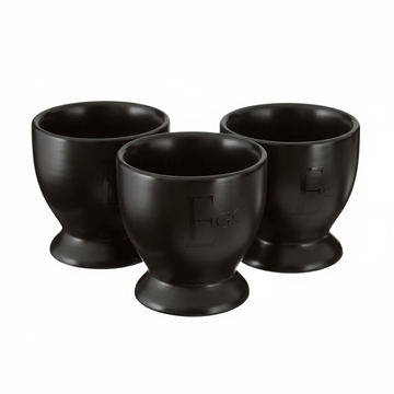 Set Of Four Black Text Egg Cups