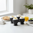 Set Of Four Black Text Egg Cups