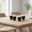 Set Of Four Black Text Egg Cups