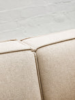 Toulouse Cream Fabric Armless Sofa.
