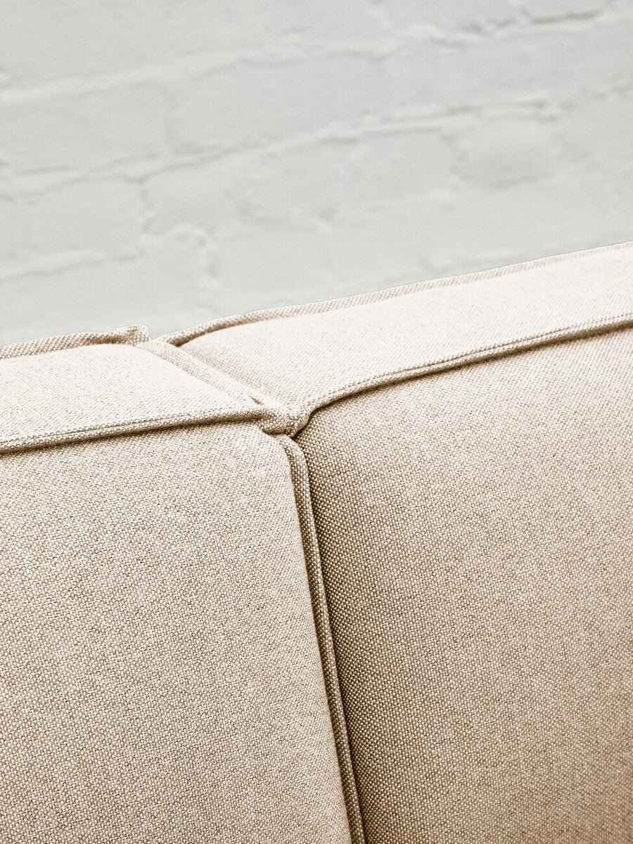 Toulouse Cream Fabric Armless Sofa.