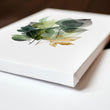 Wall Art Greenery Botanical Watercolour Leaves White Green Ochre displayed on a wall in a styled room — view 2