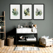 Wall Art Greenery Botanical Watercolour Leaves White Green Ochre displayed on a wall in a styled room — view 4