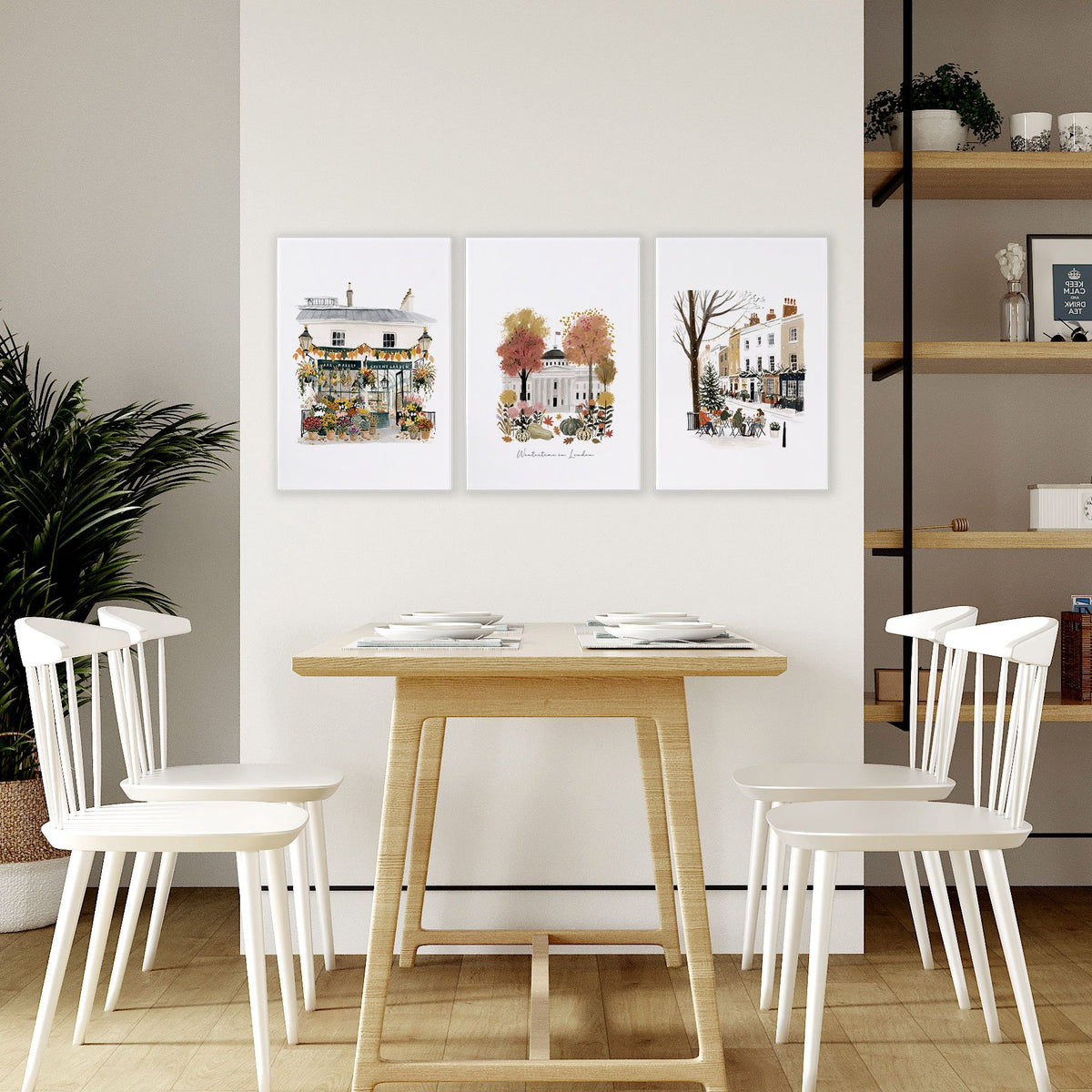 Wall Art London Seasonal Scenes | "Wintertime in London" Travel Illustration Set of 3 displayed on a wall in a styled room — view 5