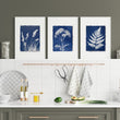 wall paintings for kitchen displayed on a wall in a styled room