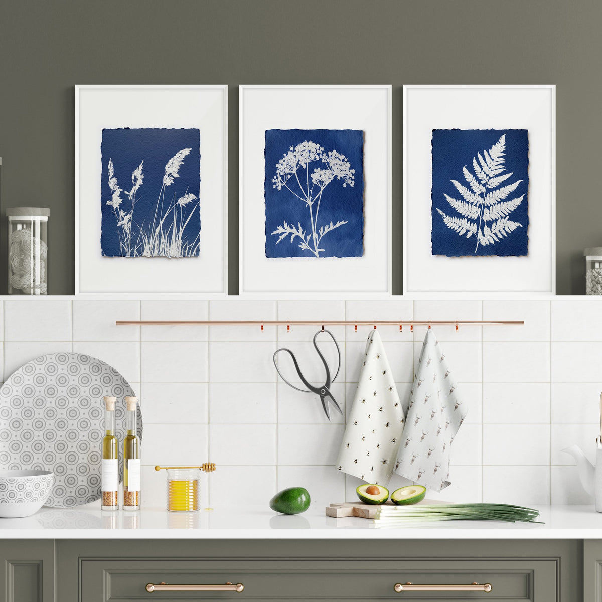 wall paintings for kitchen displayed on a wall in a styled room