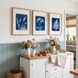 wall paintings for kitchen displayed on a wall in a styled room — view 3