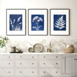 wall paintings for kitchen displayed on a wall in a styled room — view 6