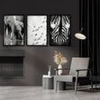 Wildlife Art wall art Black & White Safari — Elephants, Birds & Zebra displayed on a wall in a styled room — view 2
